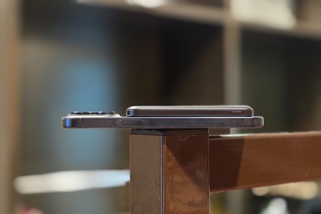Anker Nano Wireless Power Bank attached to an iPhone 15 Pro Max
