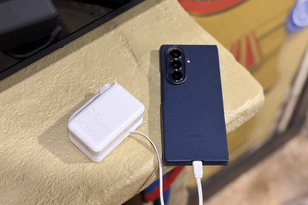 Anker Nano Retractable Power Bank connected to a smartphone